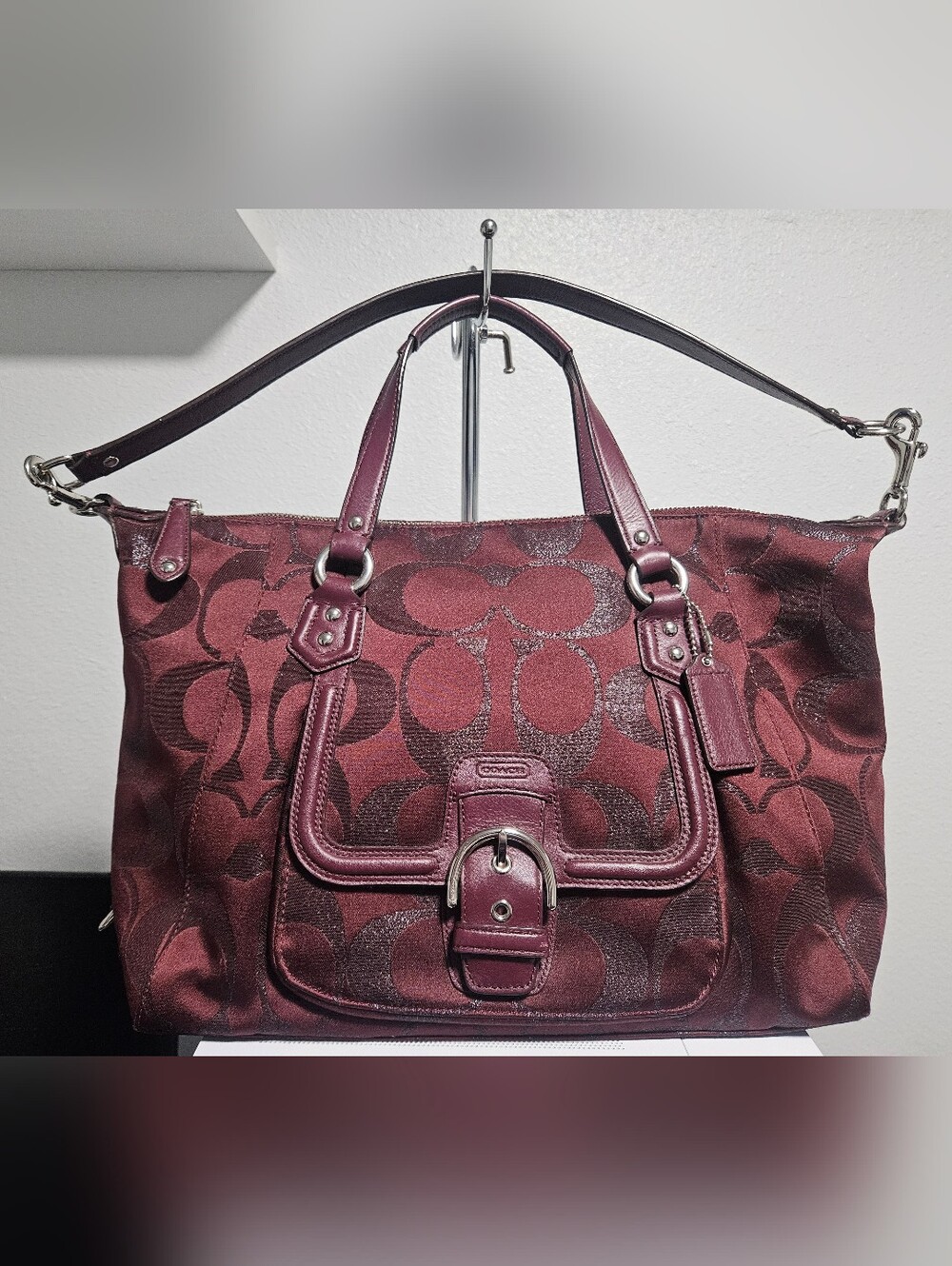 13' Coach Campbell Signature Metallic Belle Carryall in maroon sateen canvas.